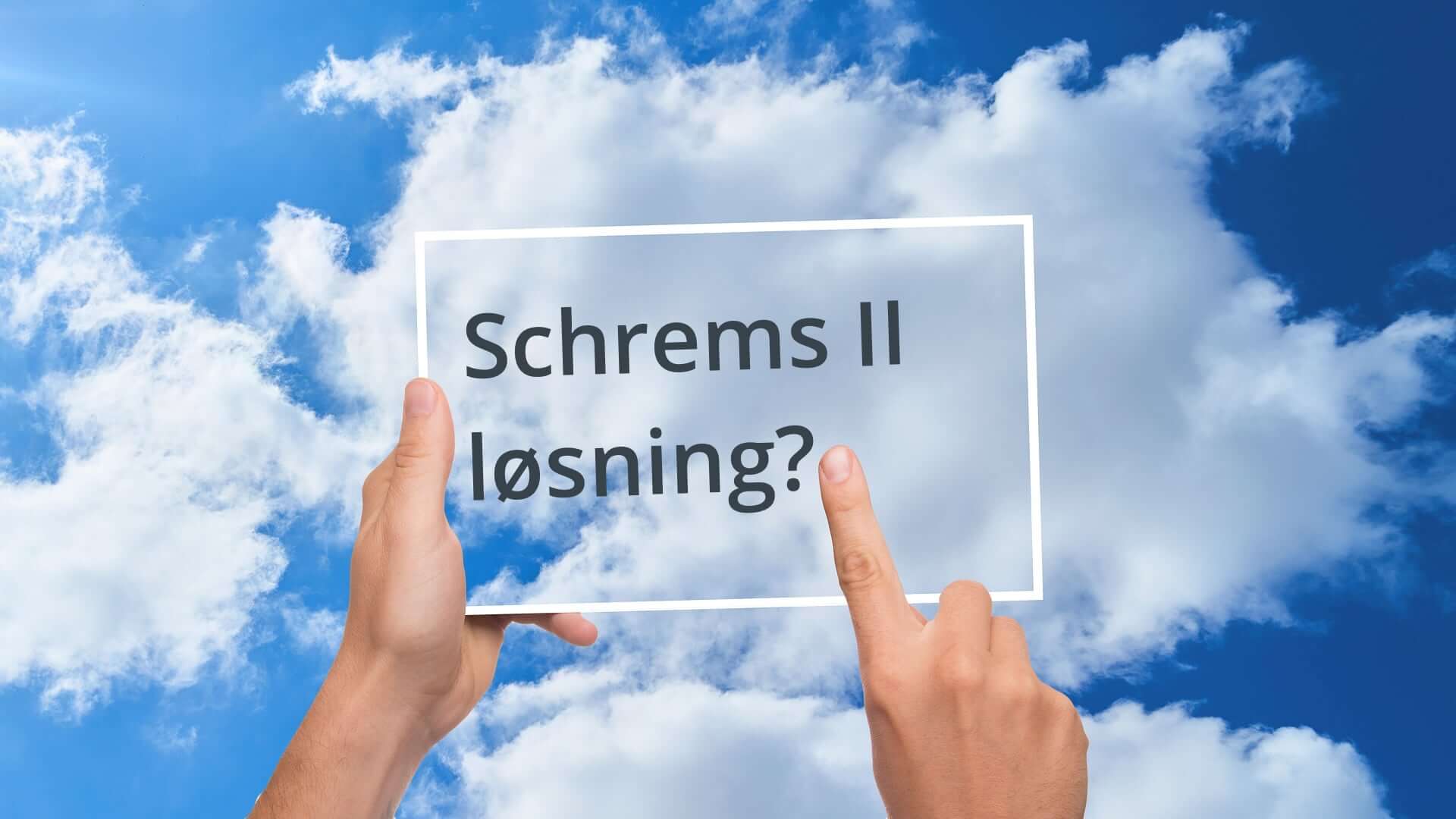 Schrems II løsning skrevet i ramme mot blå himmel med skyer